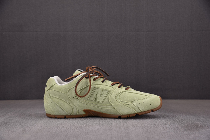 M*u M*u x New Balance Leather Sneakers UM002